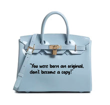 Load image into Gallery viewer, Light blue leather personalized Beachkin tote bag with top handles and gold-tone lock from Travellers Hat Boutique
