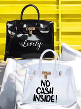 Load image into Gallery viewer, Personalized Beachkin tote bags in black and clear with custom text designs from Travellers Hat Boutique
