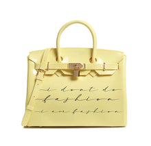 Load image into Gallery viewer, Yellow personalized Beachkin tote bag with black script text and gold lock detail
