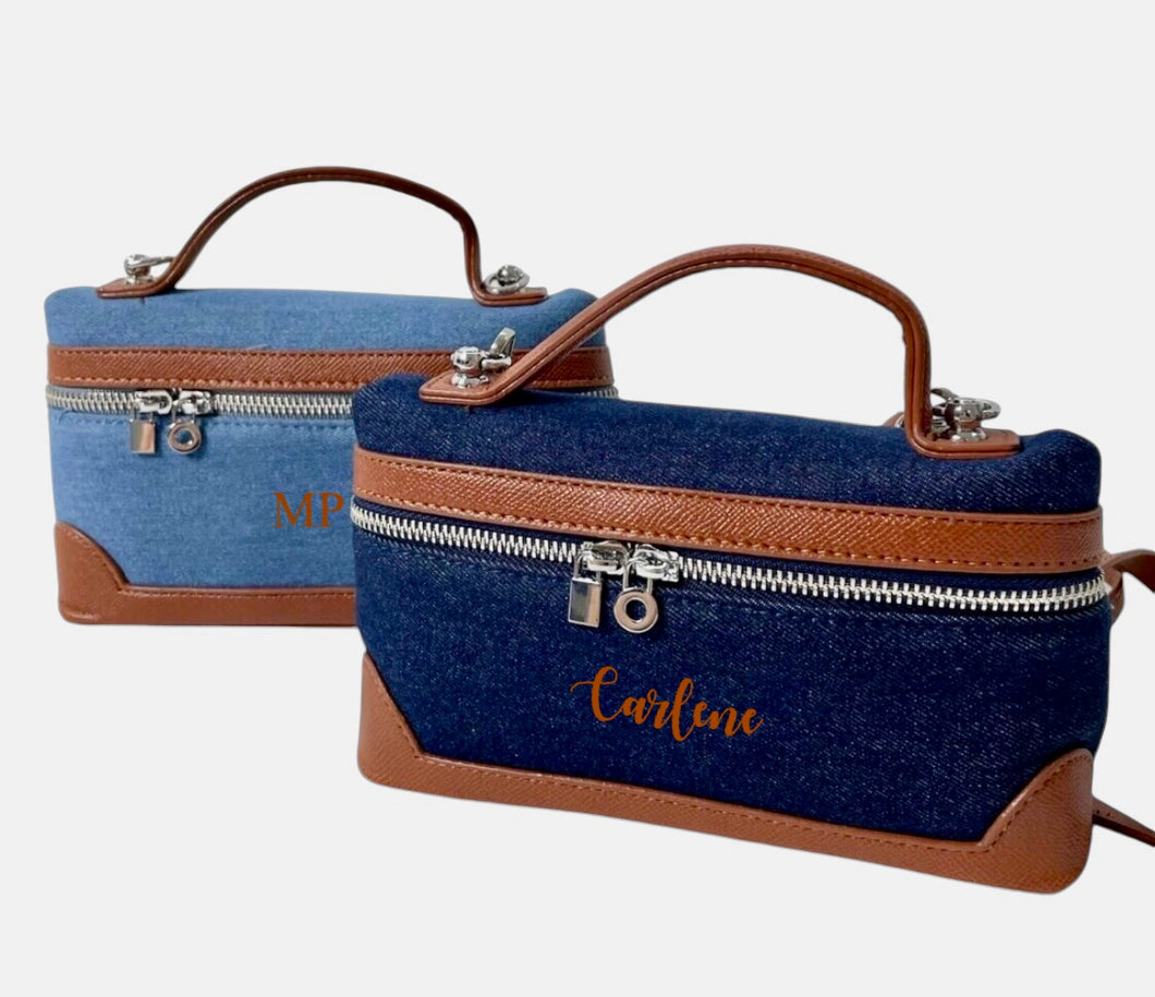 Custom square denim purse tote bags by Travellers Hat Boutique in blue and dark blue with brown handles and zipper accents