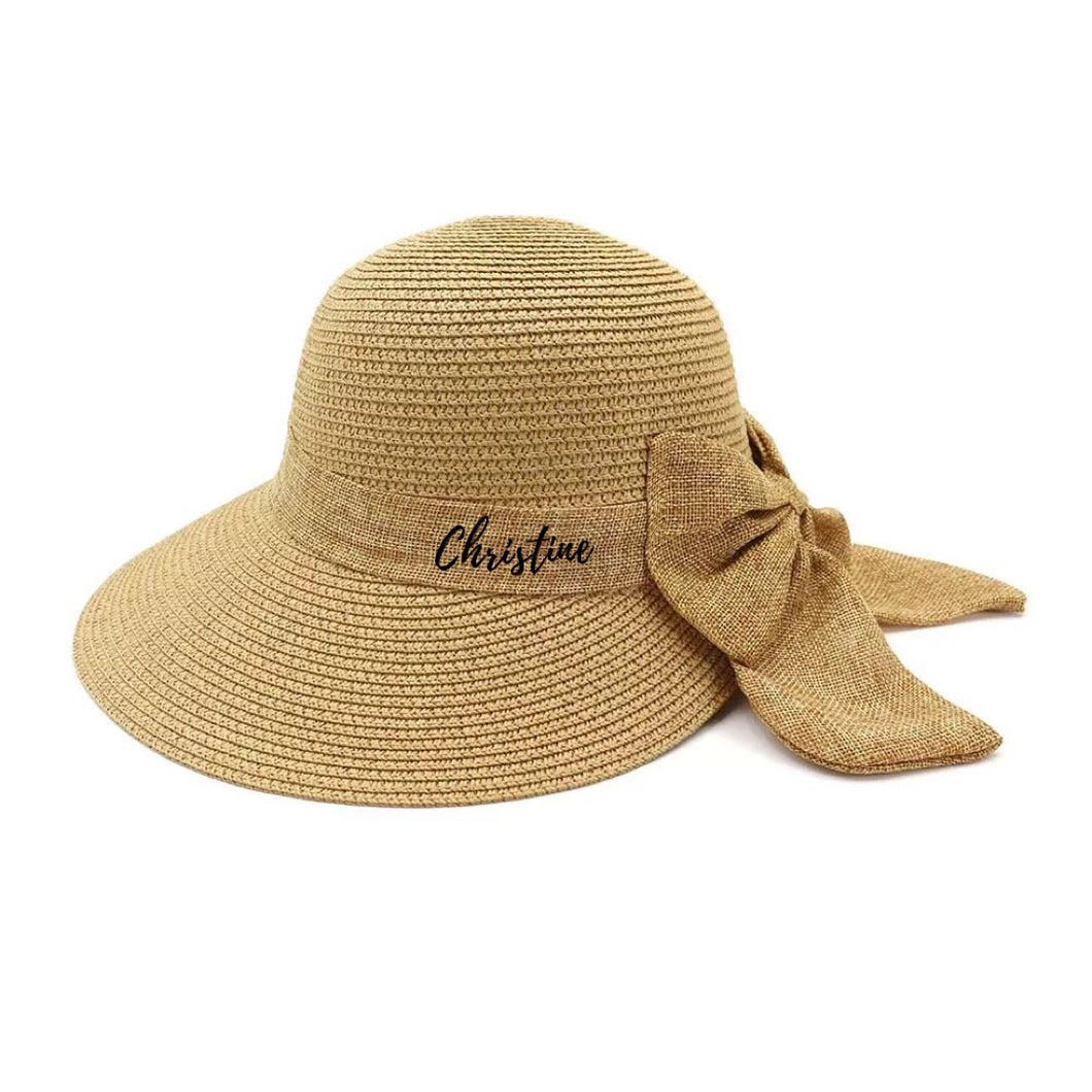 Personalized straw hat for women with wide brim and bow from Travellers Hat Boutique